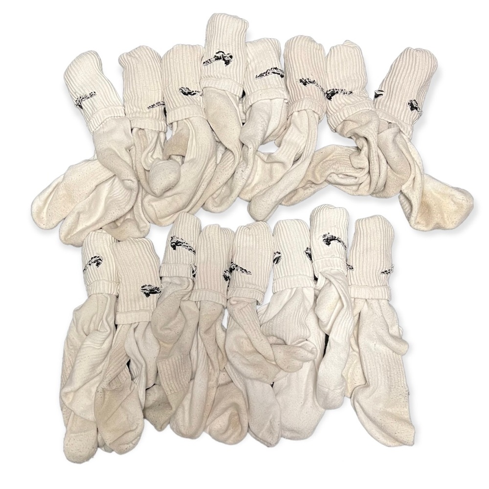 16 pairs of white Nike socks